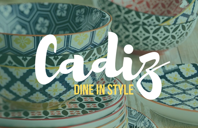 bowls in various patterns of blue, yellow and red under the words Cadiz dine in style