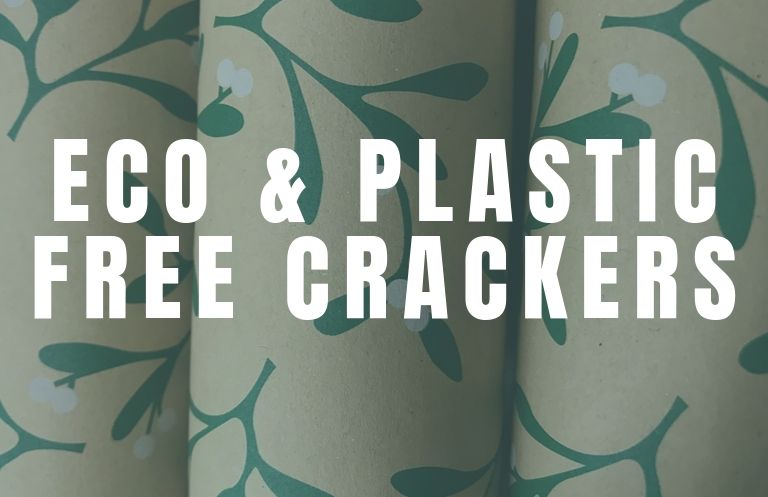 Christmas crackers with mistletoe design under the words eco and plastic free crackers